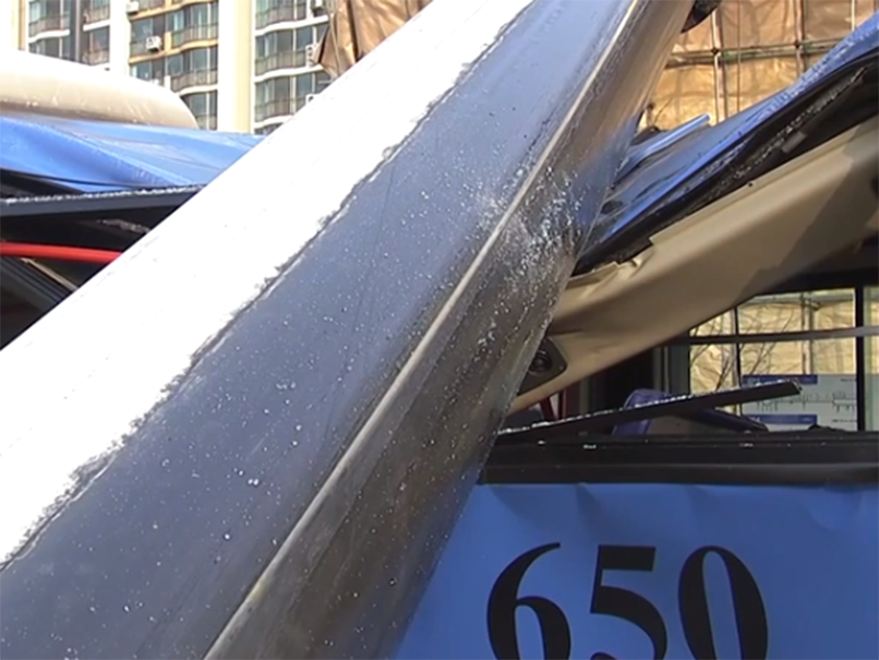 The crane had been operating in a building site on the opposite side of the street in the tragedy near the Gangseo District in the city