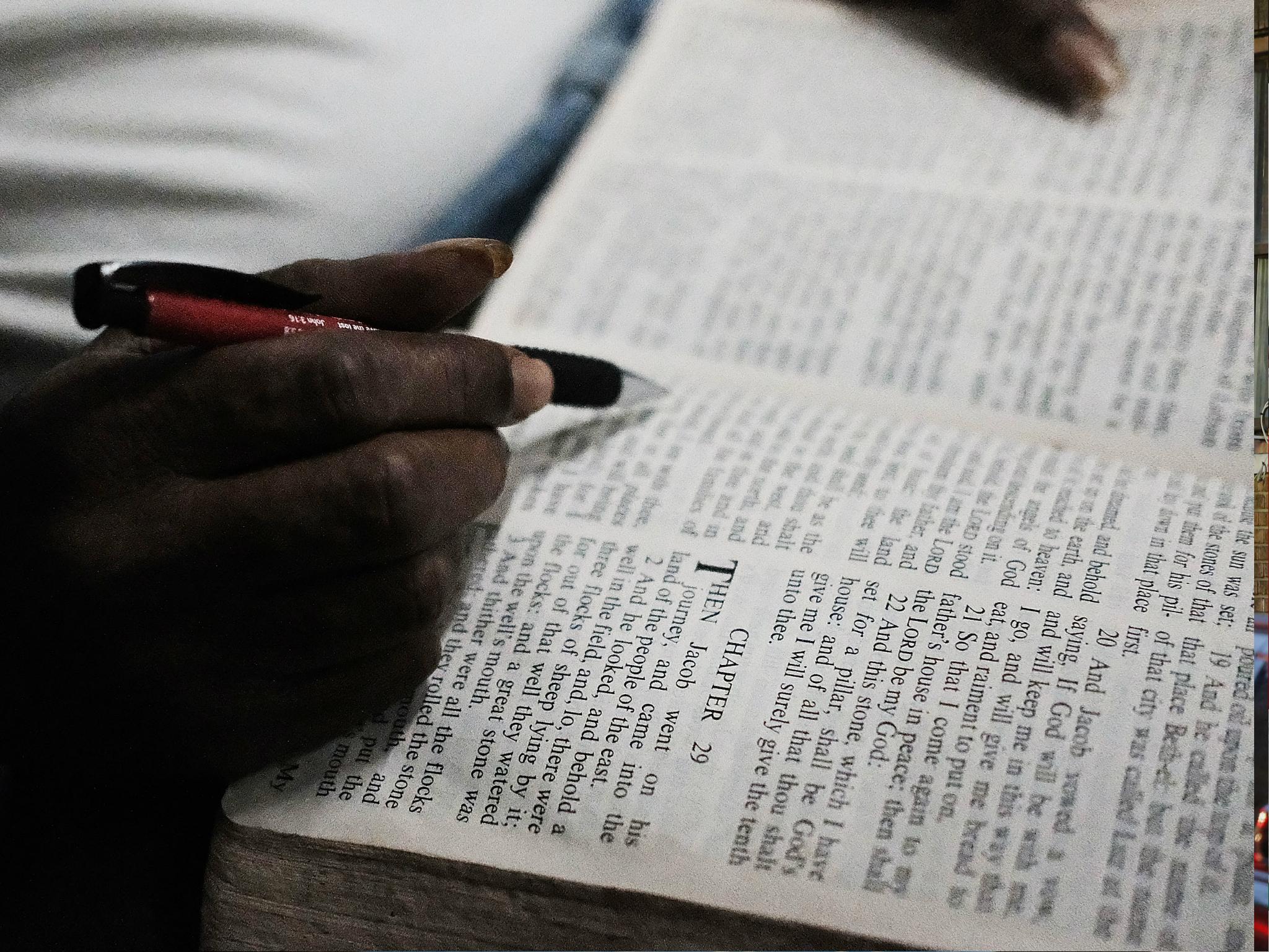 A woman reads the Bible. Sattler College, a Christian university, is set to open in the fall of 2018 in Boston, Massachusetts.