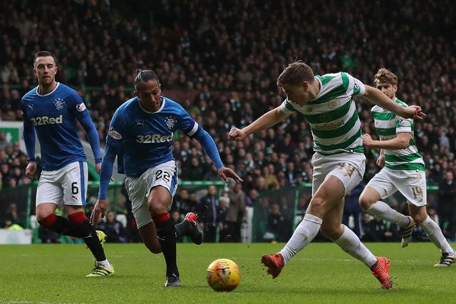 James Forrest takes a shot on goal for Celtic
