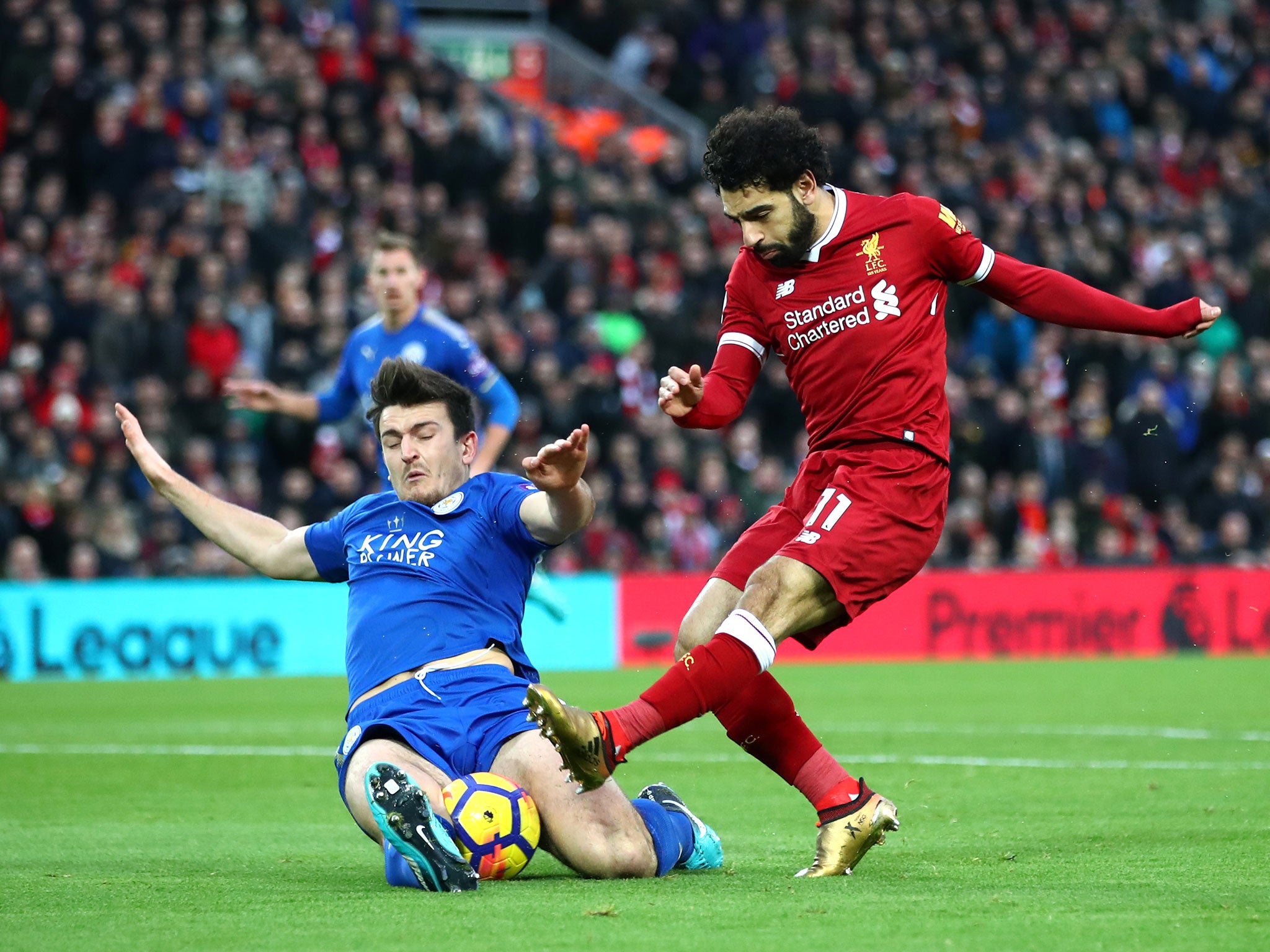 Harry Maguire blocks Mohamed Salah's shot with a smothering tackle