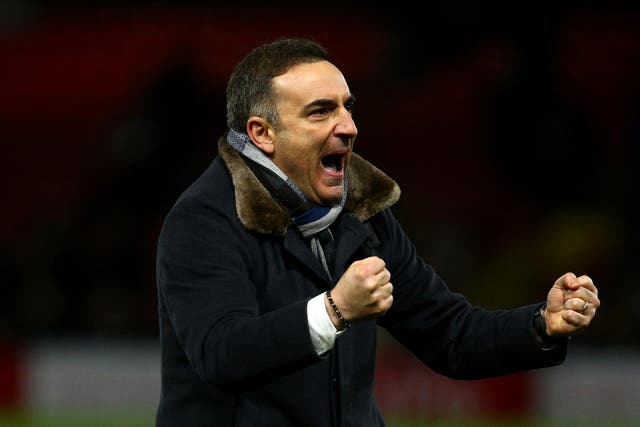 Carlos Carvalhal celebrates after the final whistle at Vicarage Road