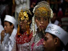 Hundreds of couples tie knot in Indonesia mass wedding to ring in 2018