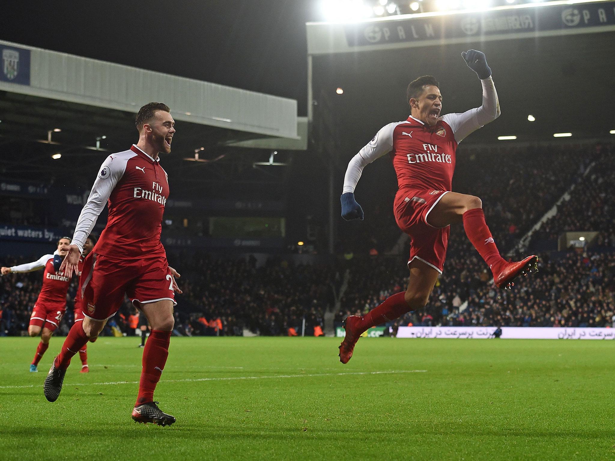 Alexis Sanchez celebrates breaking the deadlock