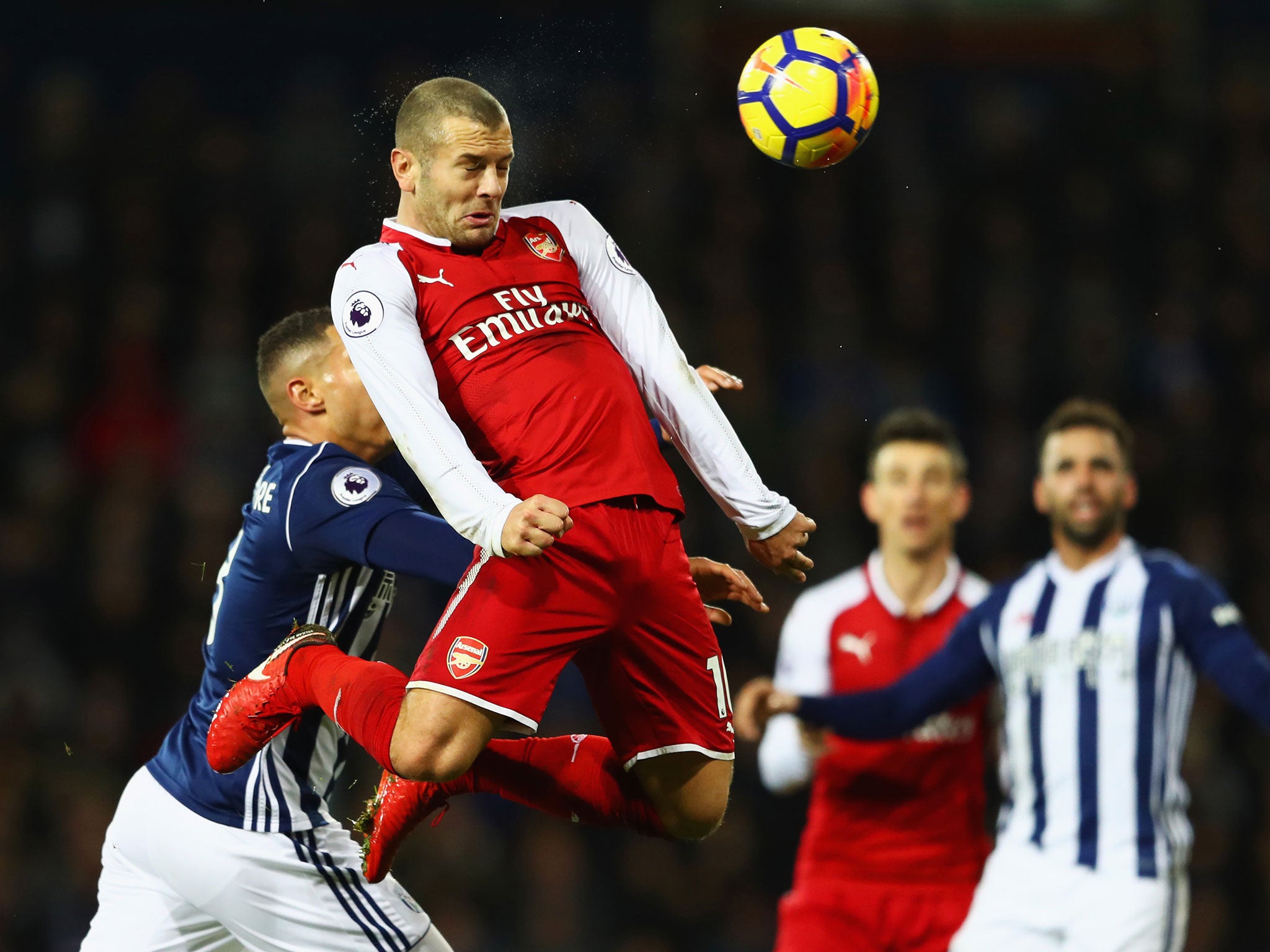 Jack Wilshere rises highest to head the ball