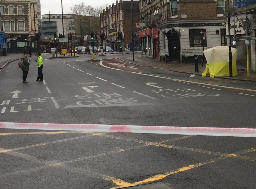 A police tent marks the spot in Tulse Hill where a 17-year-old boy died after a stabbing