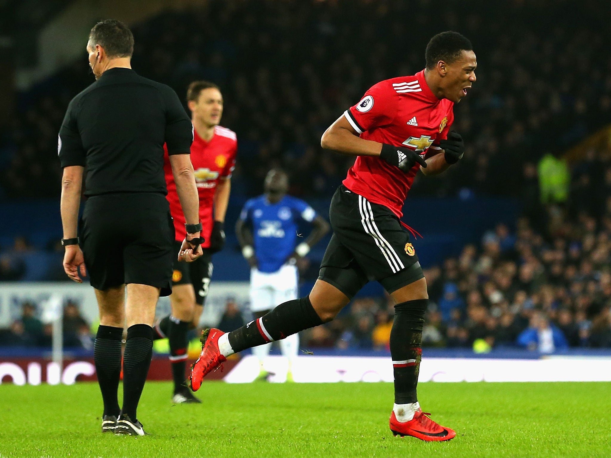Anthony Martial celebrates his goal for the visitors