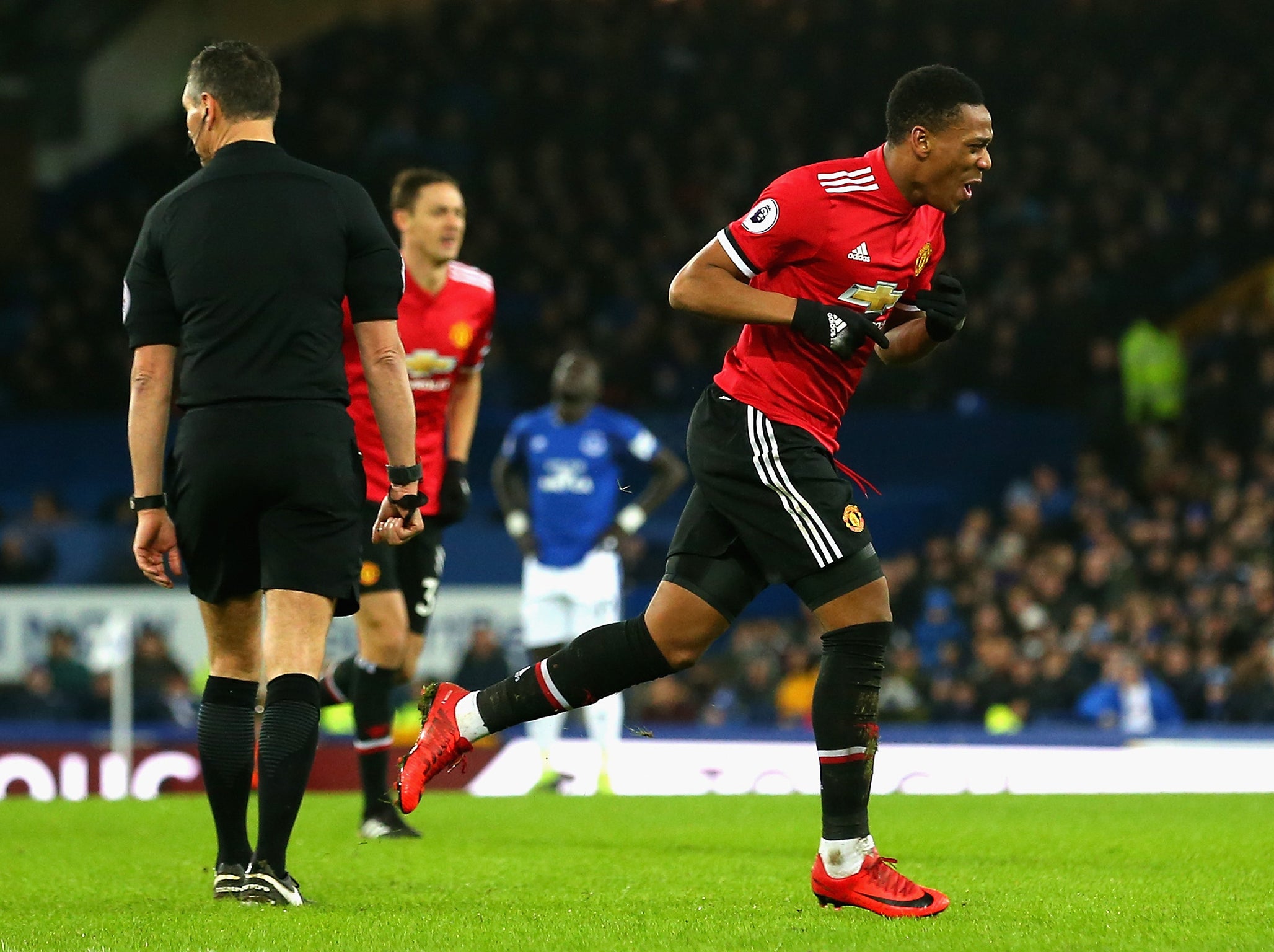 Martial runs to celebrate his second-half goal