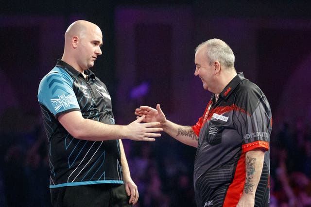 Rob Cross beat Phil Taylor 7-2 in the 2018 world championship final