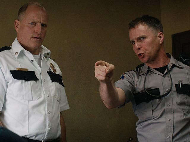 Officer Jason Dixon (right), played by Sam Rockwell, has stirred frenzied debate online