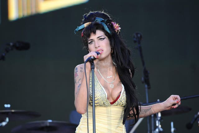 Amy Winehouse performs on stage during Rock in Rio Day 3 on July 04, 2008 near Madrid in Arganda del Rey, Spain. Credit: Carlos Alvarez/Getty Images.