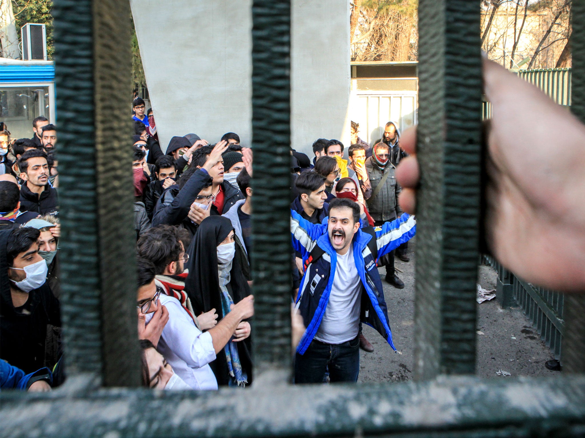 University students attend an anti-government protest inside Tehran University on 30 December