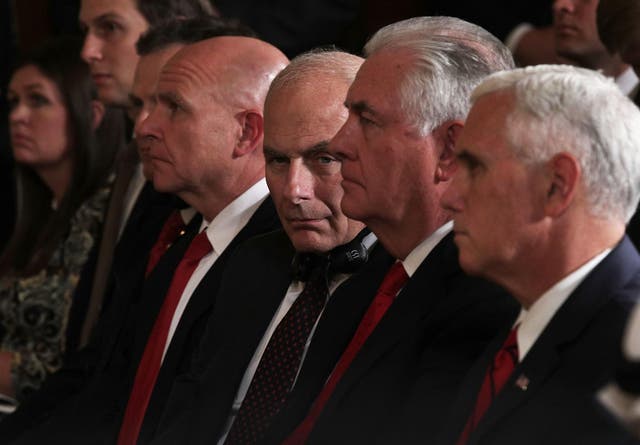 National Security Adviser HR McMaster, White House Chief of Staff John Kelly, Secretary of State Rex Tillerson and Vice President Mike Pence listen during a news conference