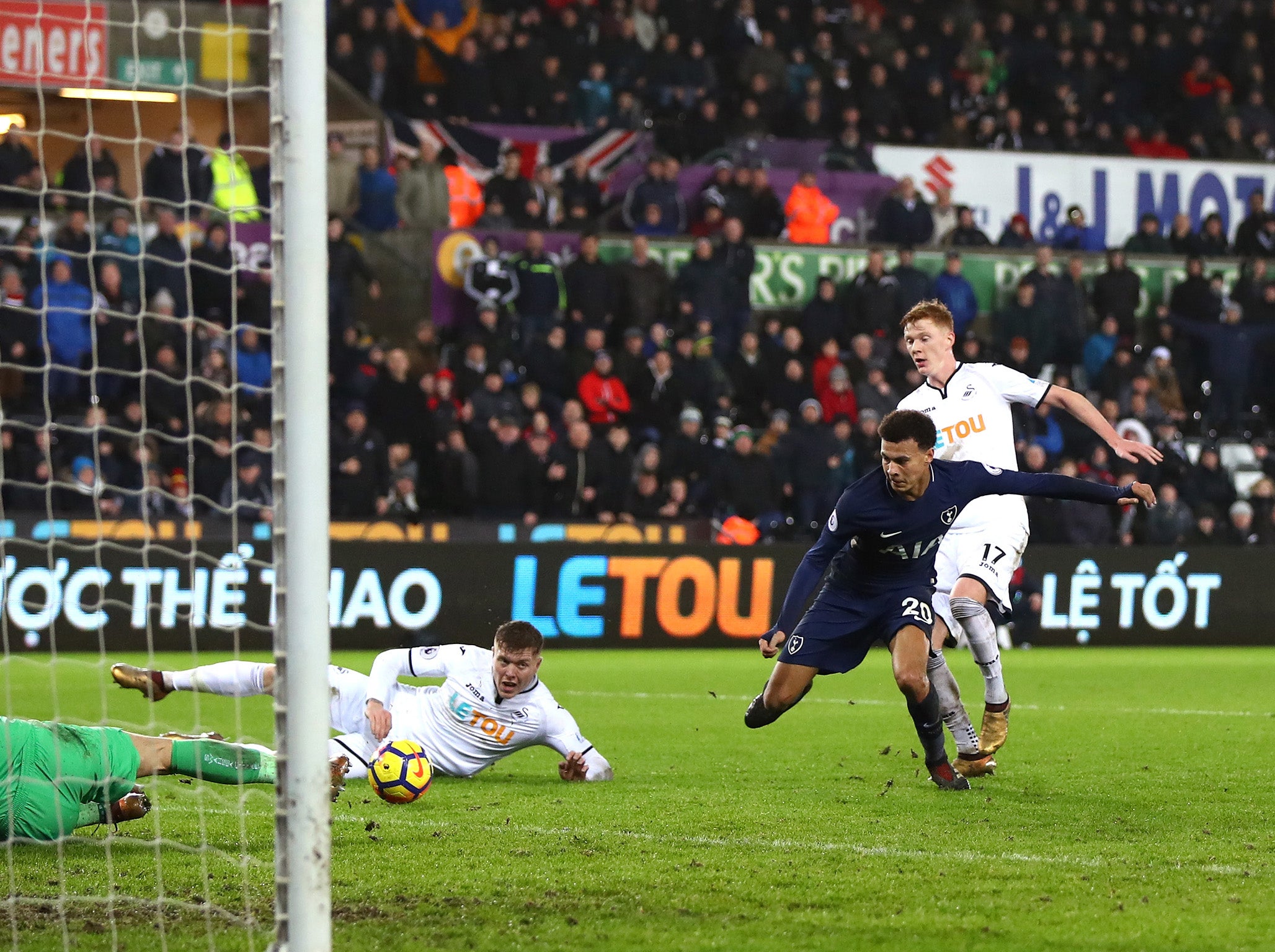 Dele Alli bundles home Tottenham's second goal