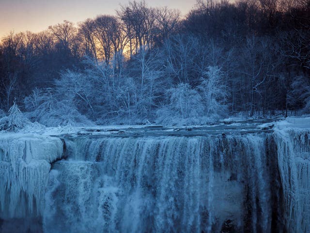 Niagara Falls, on the border of New York and Ontario, on Wednesday. Scientists are studying how climate change is influencing cold snaps in North America and Europe