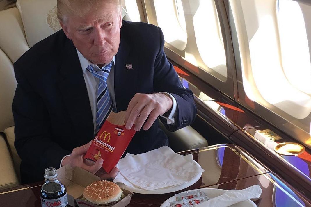 Mr Trump eating a McDonald's meal