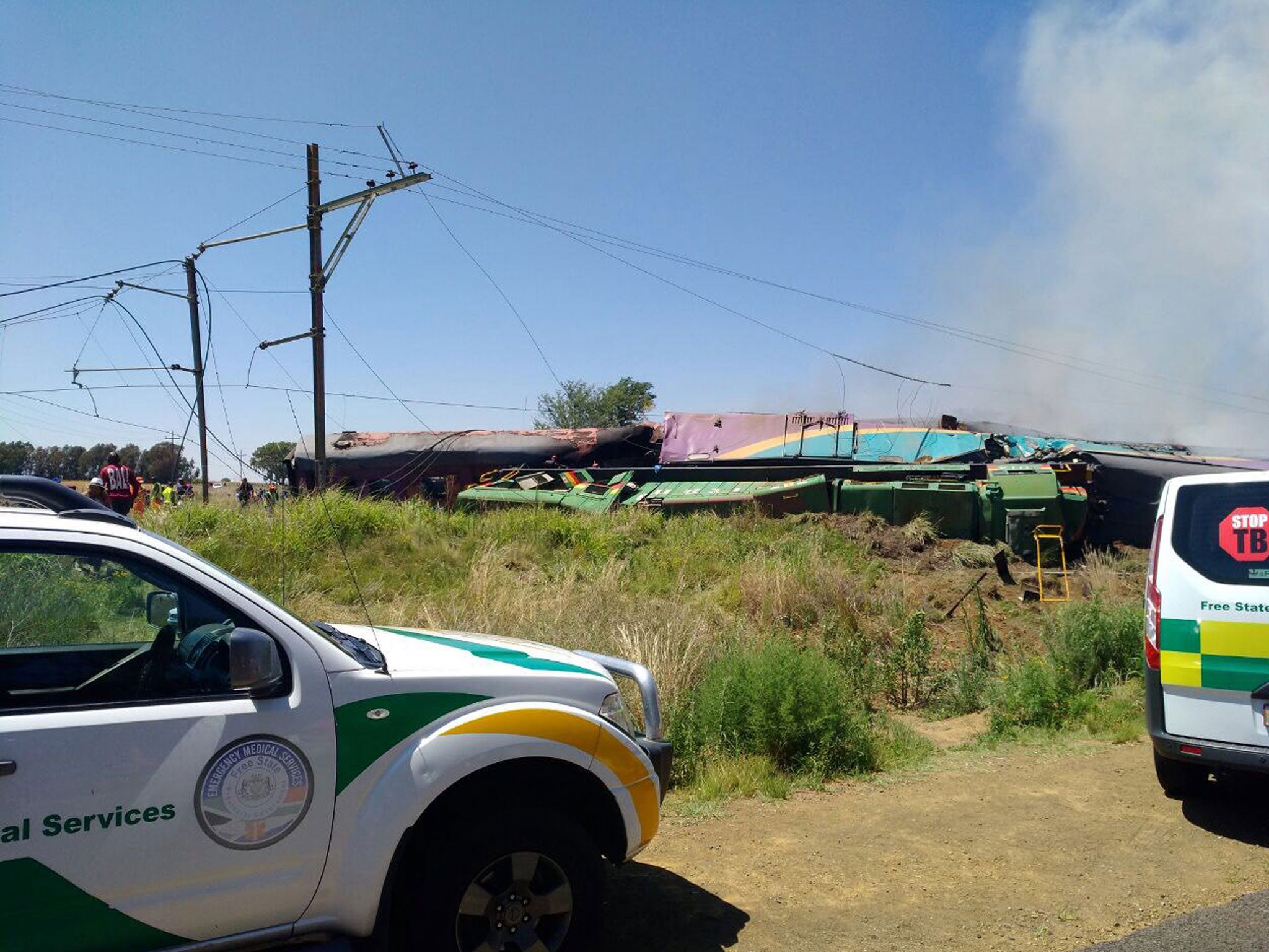 The remains of the intercity train that derailed after hitting a truck that was crossing the tracks