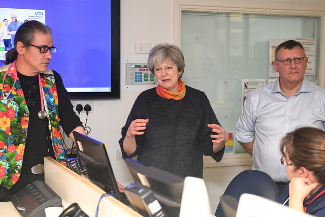 Theresa May apologised to patients during a visit to Frimley Park Hospital in Surrey