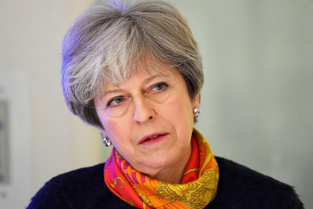 Theresa May has apologised for operations being cancelled in January