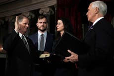Doug Jones’ openly gay son stares down Mike Pence as father sworn in