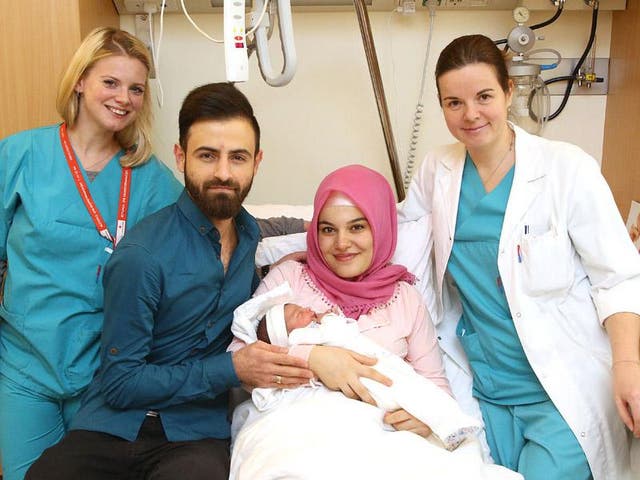 Naime and Alper Tamga with their daughter Asel, who was the first baby to be born in Vienna in 2018