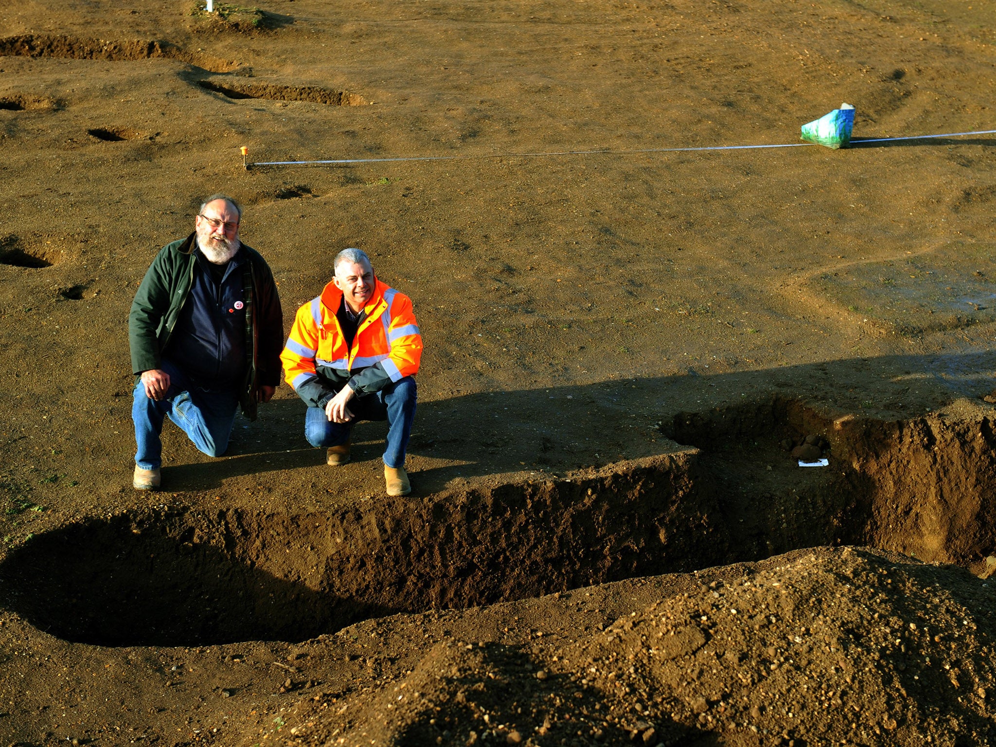 Archaeologist John Tibbles (front left) with John Bird Managing Director of Yarrows Aggregates at Little Catwick Quarry at Leven near Beverley with other archaeologists at work