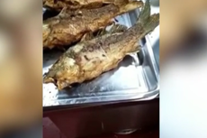 Fried fish comes alive in front of Chinese diners