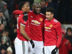Lingard and Lukaku see United safely past Derby and into round four
