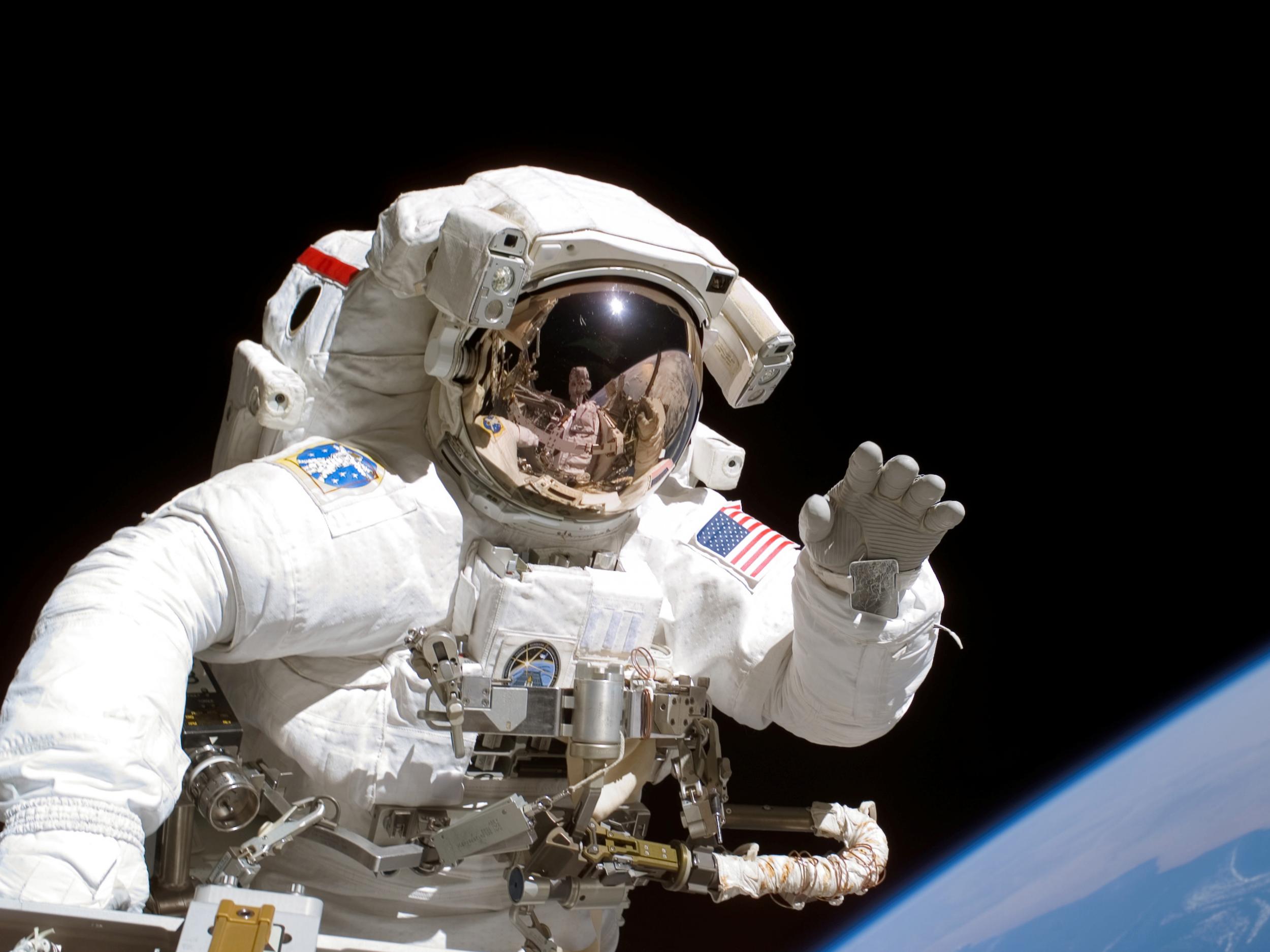 astronaut waving