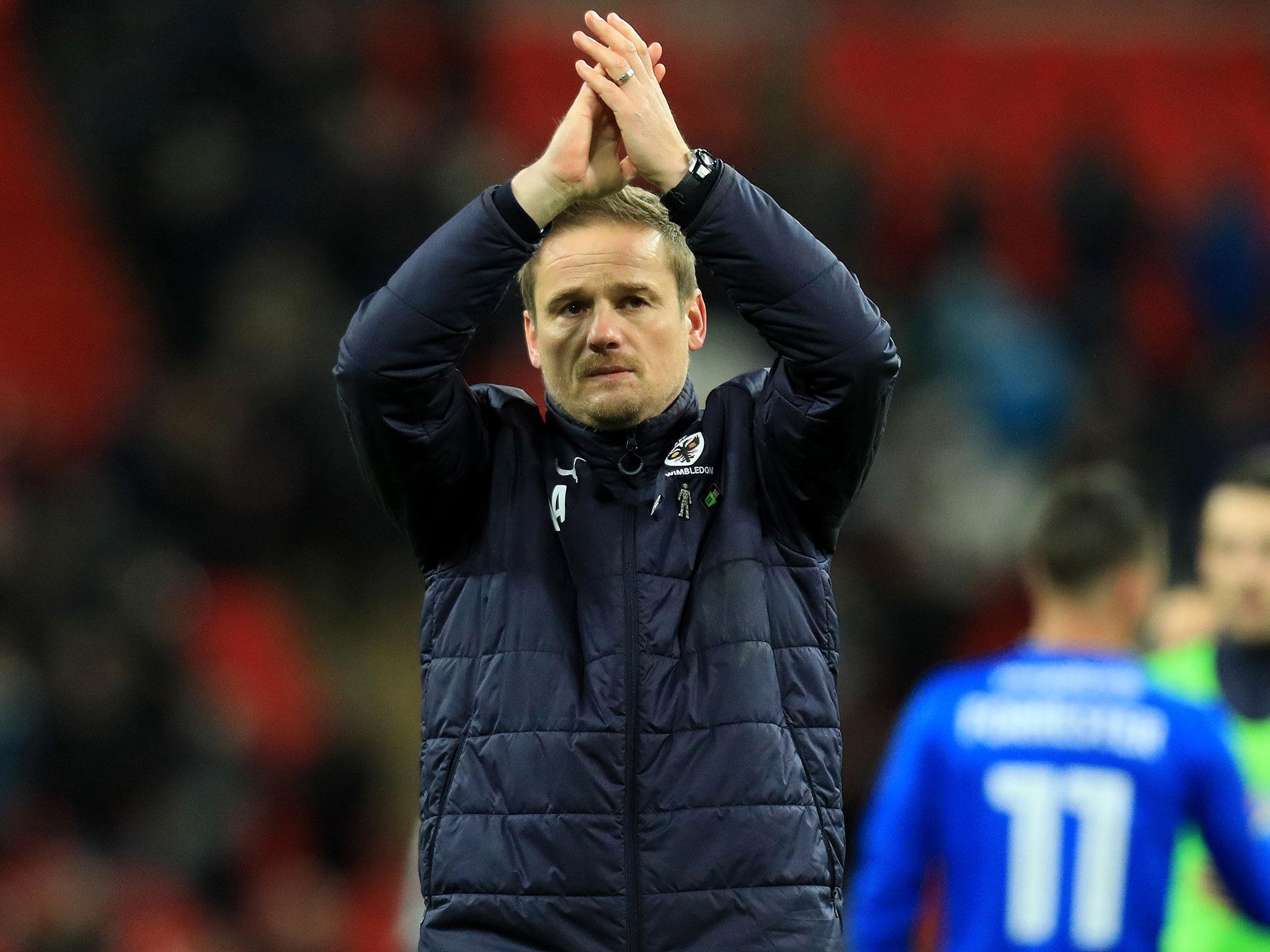 AFC Wimbledon manager Neal Ardley said his assistant was taken aback by Harry Kane's inclusion