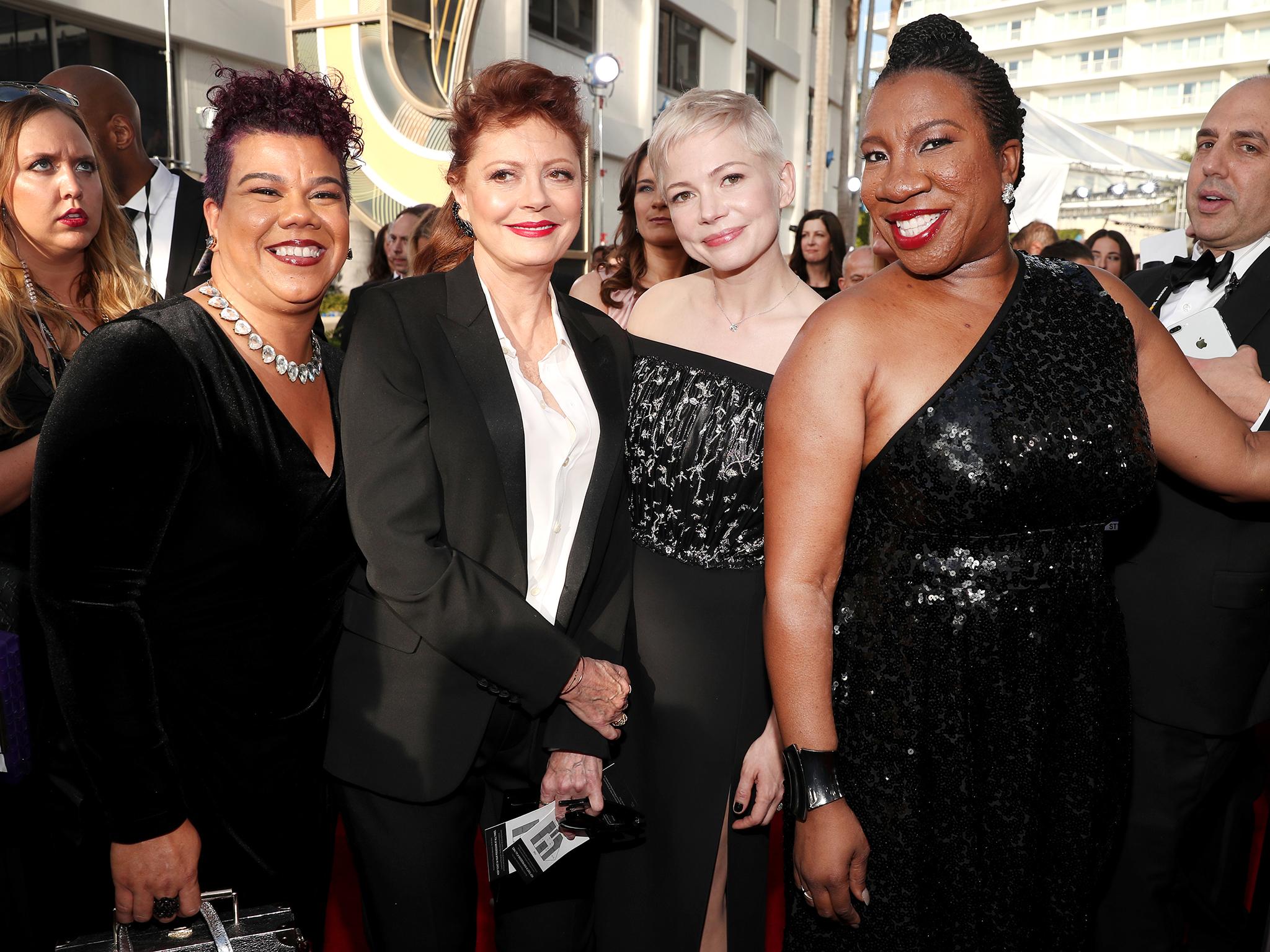 Clad in black, activist Rosa Clemente, actors Susan Sarandon and Michelle Williams and activist Tarana Burke arrive at January’s Golden Globes (NBCU Photo Bank via Getty)