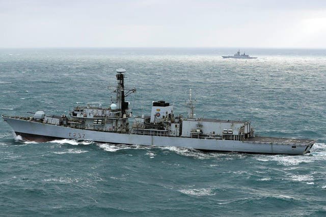 HMS Westminster (foreground) escorting the Russian frigate Boiky seen in the background
