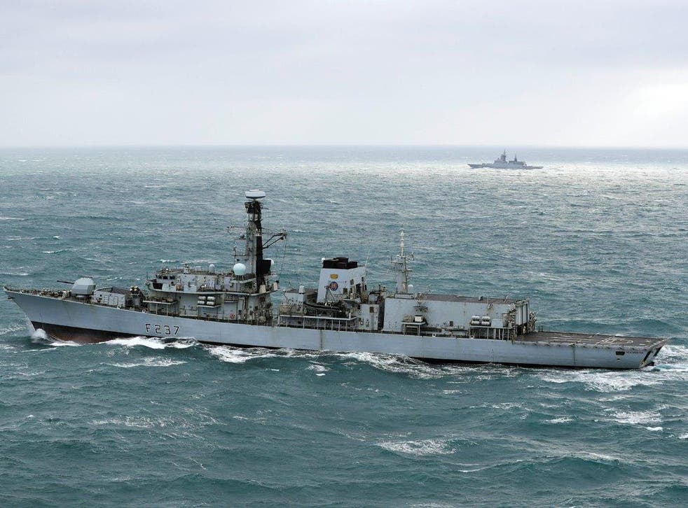 HMS Westminster (foreground) escorting the Russian frigate Boiky seen in the background