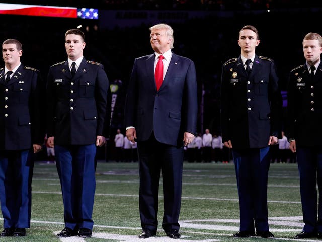 US President Donald Trump during the national anthem prior to the CFP National Championship