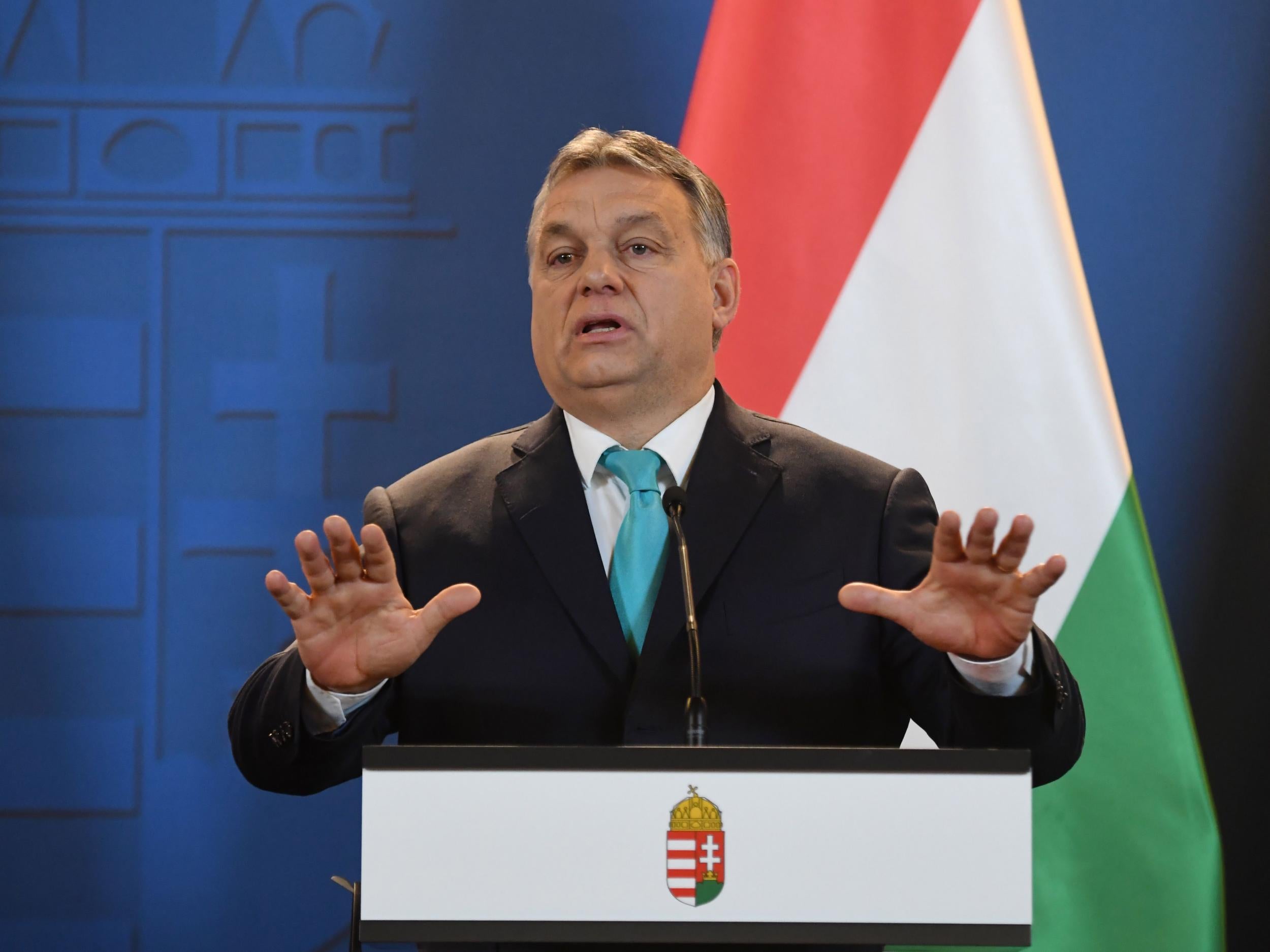 Prime Minister of Hungary Viktor Orban gestures as he gives a press conference at the Hungarian parliament in Budapest on January 3, 2018