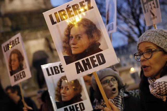 Demonstrators hold posters reading: "Release Ahed" during a protest demanding Israel to release Palestinian teenager Ahed Tamimi in Paris on Thursday 4 January 2018