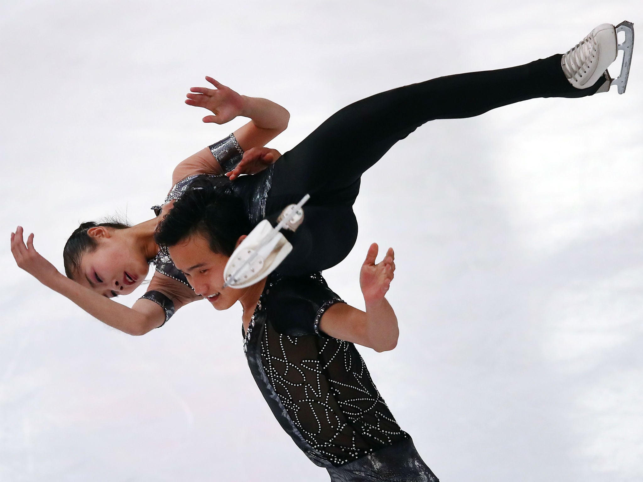 Ryom Tae-Ok and Kim Ju-Sik of North Korea compete in Oberstdorf, Germany