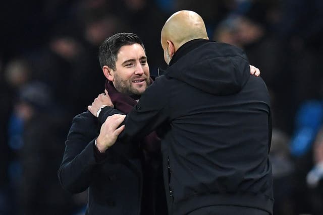 Lee Johnson and Pep Guardiola shared a word after the final whistle