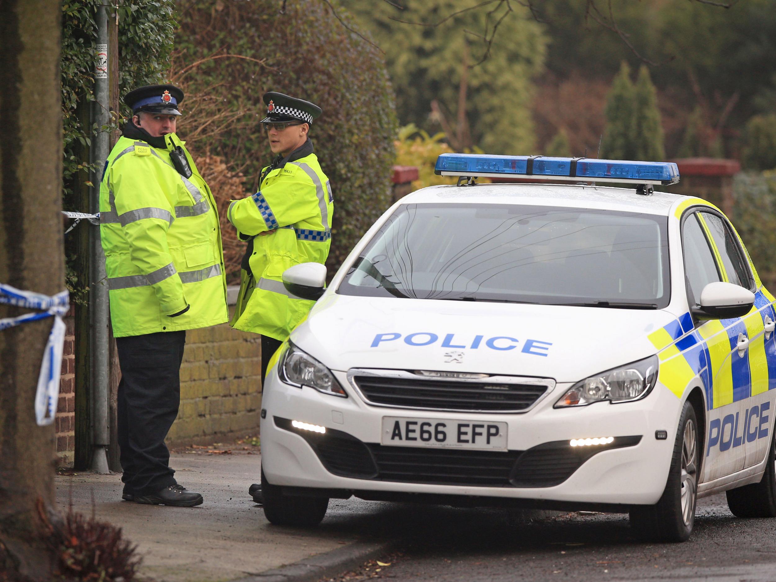 Police at the scene of an investigation at Matlock Road in Reddish on the outskirts of Manchester, as a woman who told police she had killed a man and buried him in a garden is being questioned by murder detectives following the discovery of human remains
