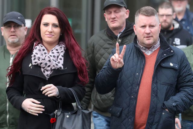 Britain First leader Paul Golding leaves Belfast Magisrates' Court alongside his Jayda Fransen and supporters after a hearing on 10 January
