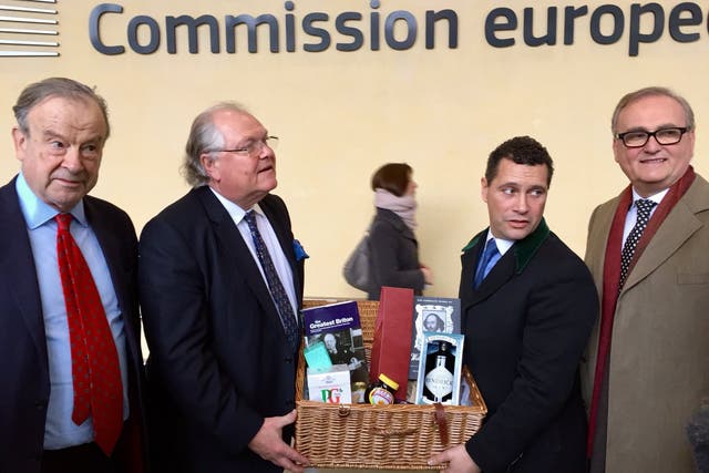 The hamper, delivered by Brexit campaigners including by former CBI head Digby Jones (second left) and MEP Steven Woolfe (third left)