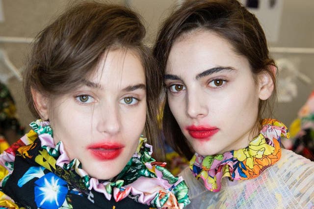 In the red: models backstage ahead of the Preen by Thornton Bregazzi show