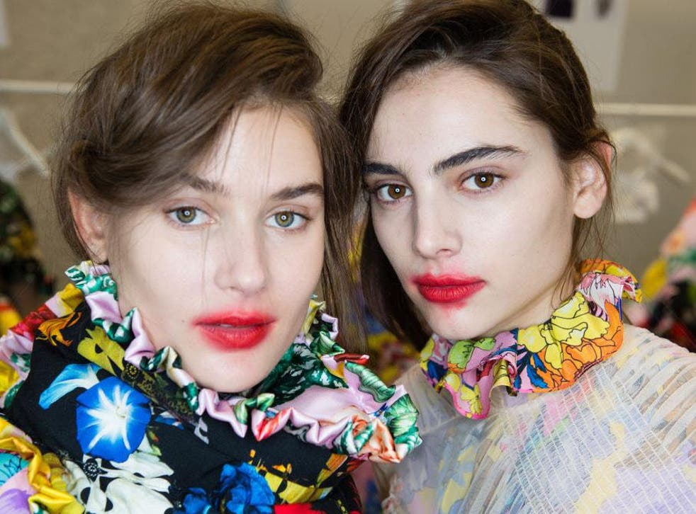 In the red: models backstage ahead of the Preen by Thornton Bregazzi show