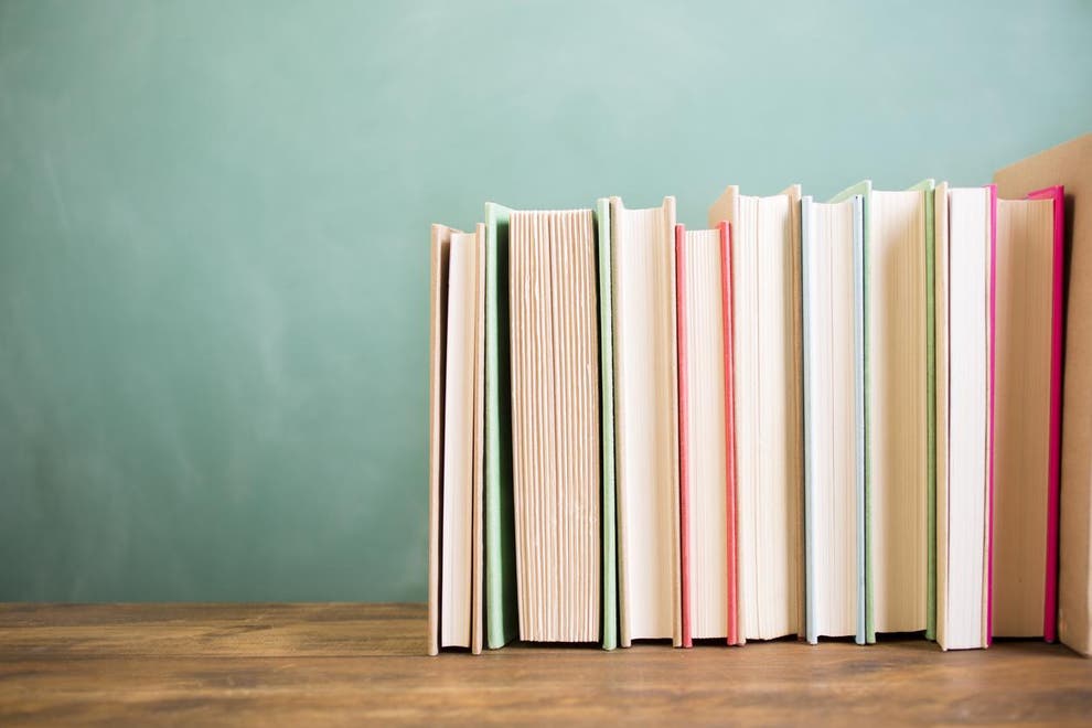 Backwards bookshelves Impractical trend for stacking books with spines