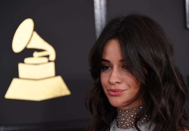 Camila Cabello arrives for the 59th Grammy Awards pre-telecast on February 12, 2017, in Los Angeles, Credit: MARK RALSTON/AFP/Getty Images