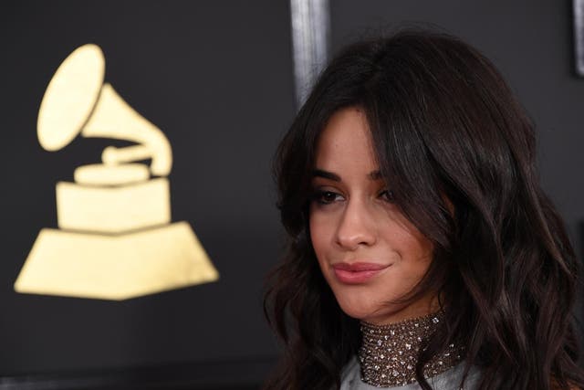 Camila Cabello arrives for the 59th Grammy Awards pre-telecast on February 12, 2017, in Los Angeles, Credit: MARK RALSTON/AFP/Getty Images