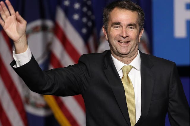 Virginia Governor Ralph Northam waves to supporters at an election night rally 7 November 2017 in Fairfax, Virginia