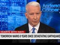 CNN anchor chokes back tears as he defends Haiti from 'racist' Trump