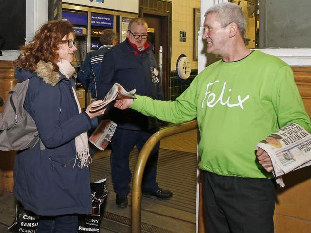 Evening Standard vendor John Coffey shows off his sweatshirt as a volunteer for the Felix Project