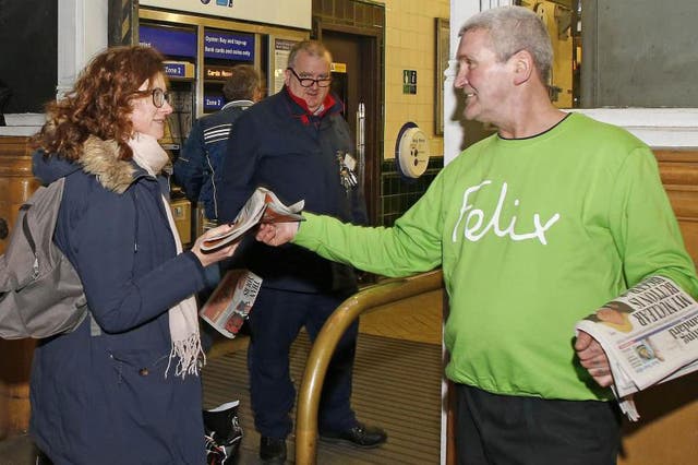 Evening Standard vendor John Coffey shows off his sweatshirt as a volunteer for the Felix Project