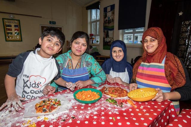 Muhammad Siddique, five, and his mother Ambreen at Stanhope with Fatimah Shah, 10, and her mother Syeda